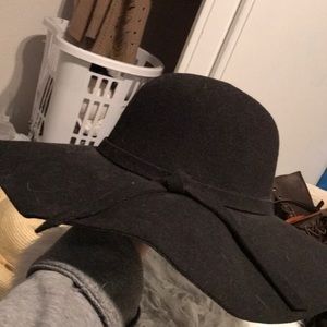 Black floppy hat. Never worn before.